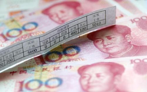 工资个人所得税是按月计算还是按年计算？